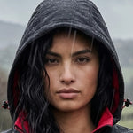 Model wearing the Regatta Navigate Two Layer Hooded Soft Shell Jacket RG454 in Black / Classic Red. hood up to show its showerproof qualities
