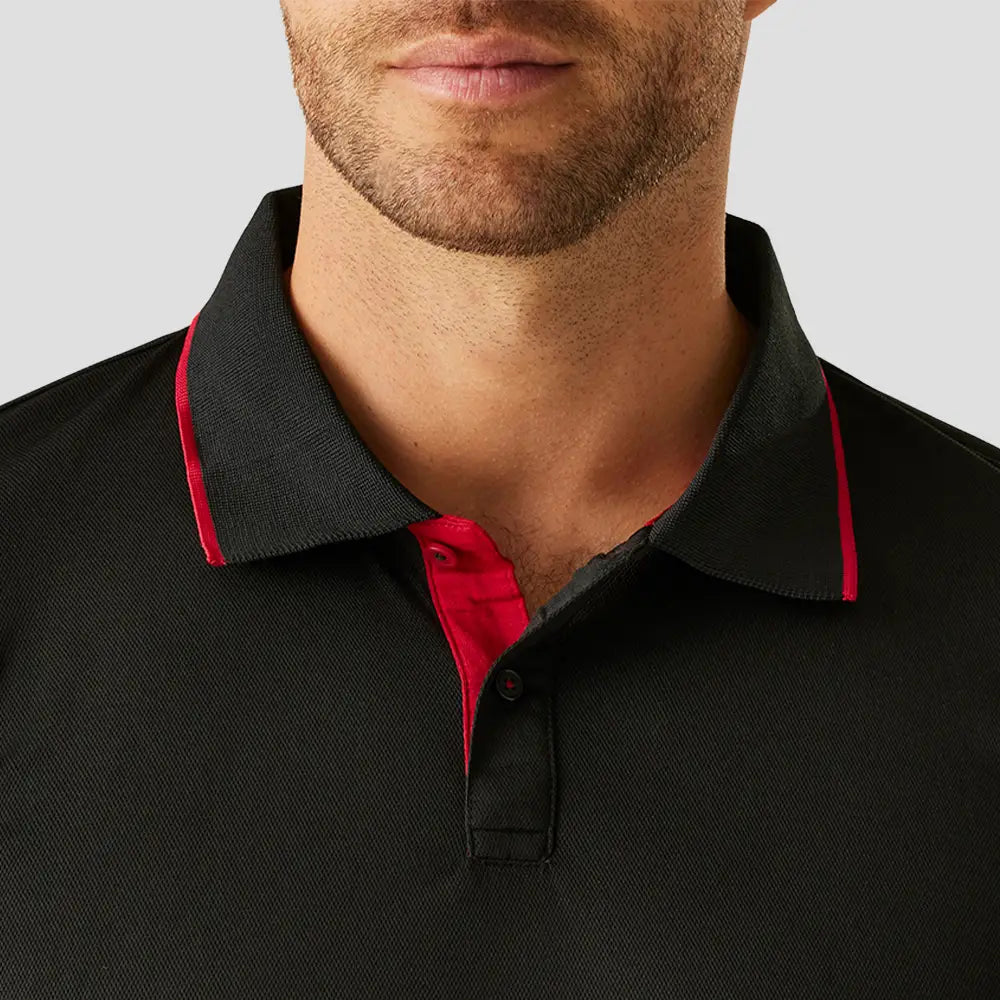 Close-up of Model wearing the Regatta Navigate Polo Shirt in Black / Red