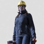 model wearing Regatta Ladies Ablaze Printable Soft Shell Jacket on construction site