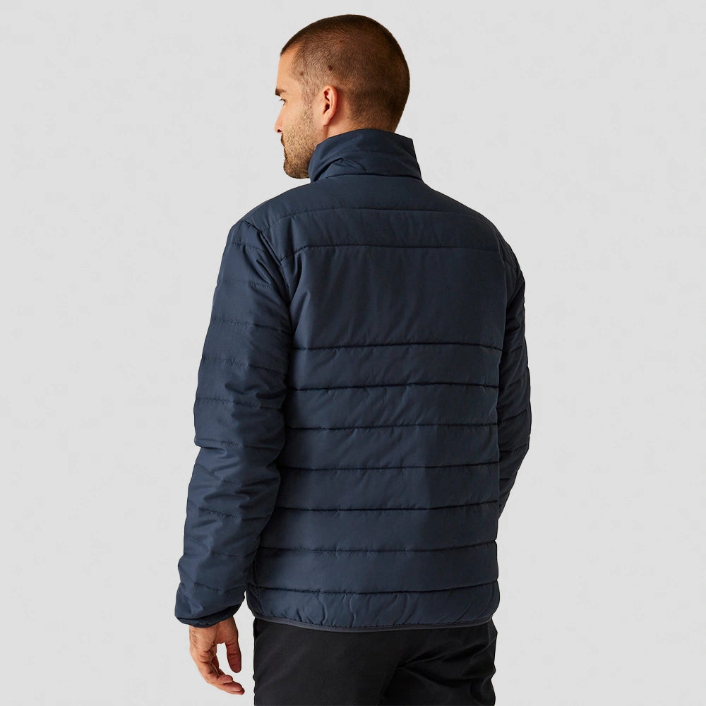 back view of model wearing Essential Thermal Jacket RG650 in navy