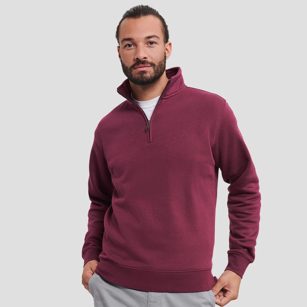 Model wearing the Russell Authentic Zip Neck Sweatshirt 270M in Burgundy