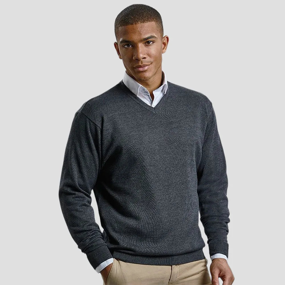 Model wearing the Russell Collection Cotton Acrylic V Neck Sweater 710M in Charcoal Marl