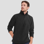 Model wearing the Russell Zip Neck Outdoor Fleece 874M in black