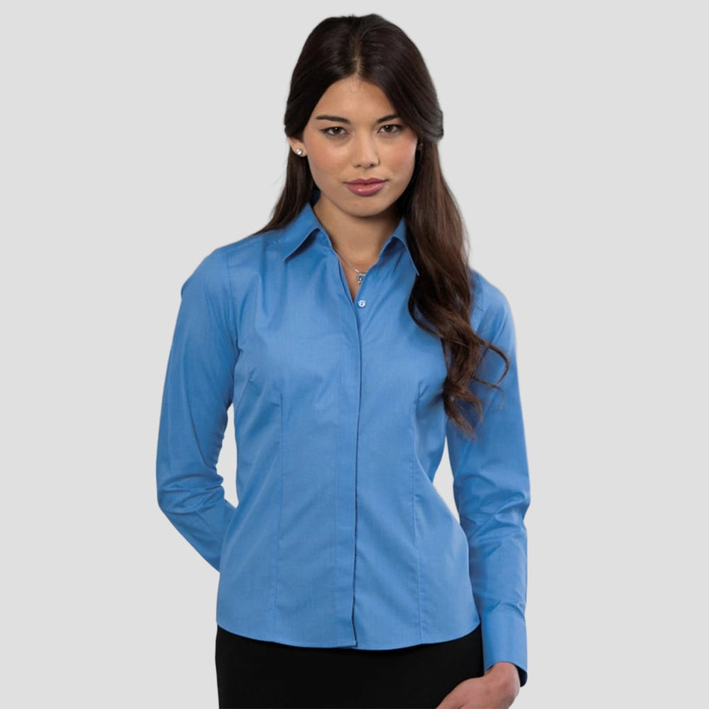 Model wearing the Russell Collection Ladies Long Sleeve Fitted Poplin Shirt 924F in Corporate Blue
