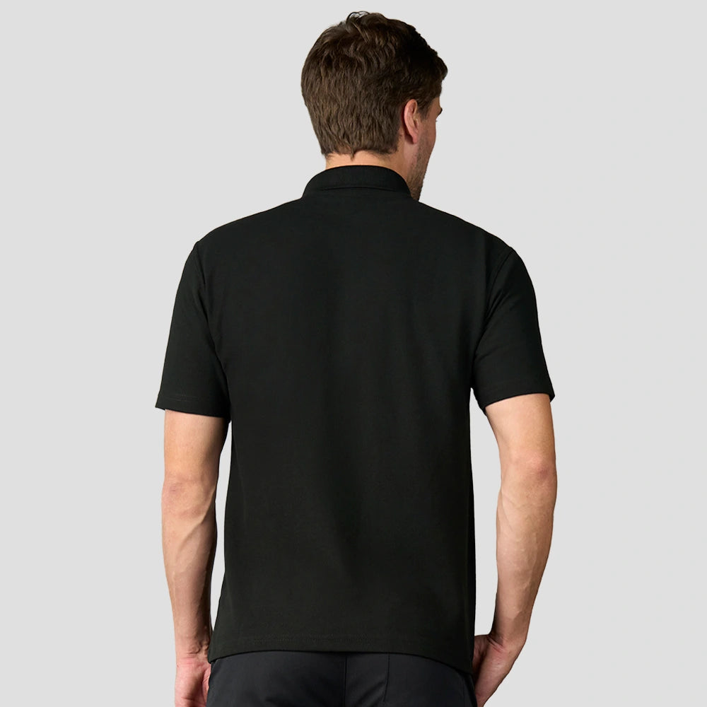 Rear view of model wearing the R101 Pro RTX Pique Polo Shirt in Black
