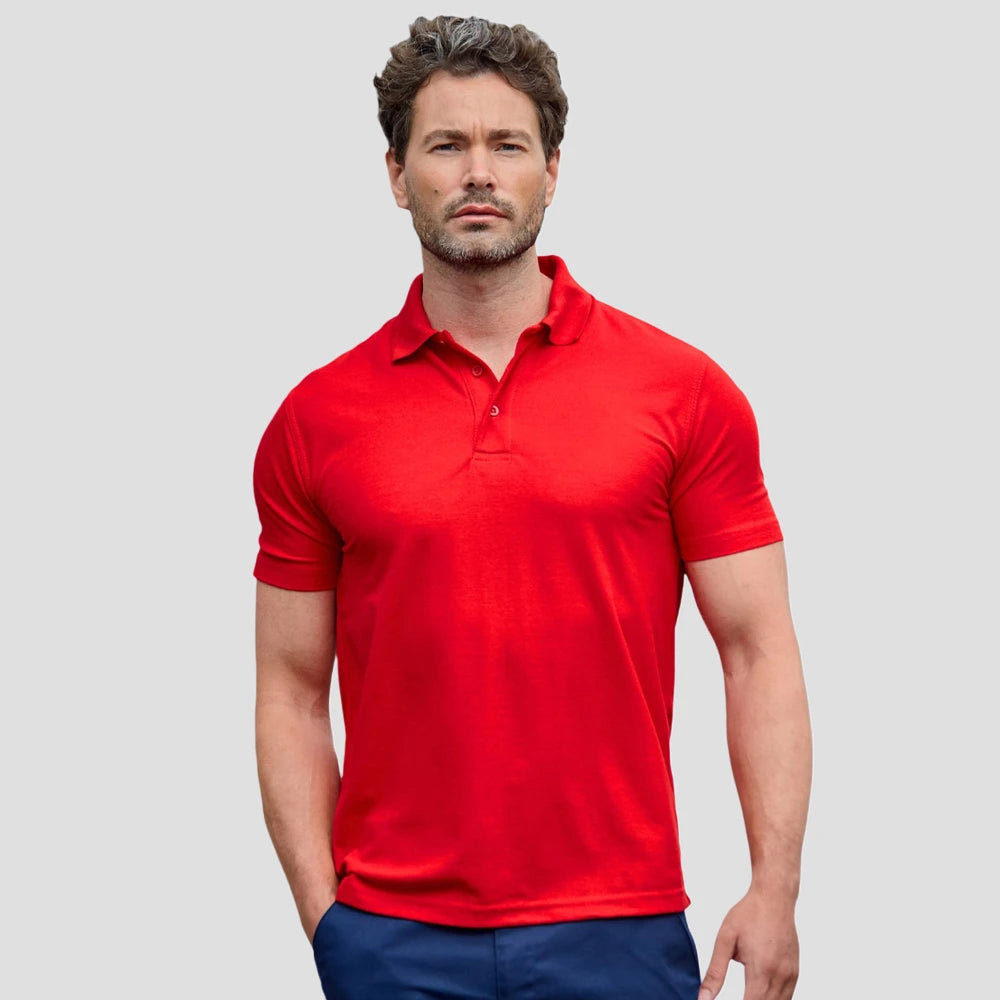 Model wearing the RX101 Pro RTX Pro Piqué Polo Shirt in Red