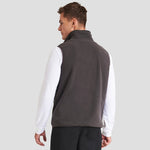 Rear view of model wearing the Pro RTX Pro Fleece Gilet in Charcoal