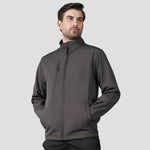 Model wearing the Pro RTX Pro Three Layer Soft Shell Jacket in Charcoal