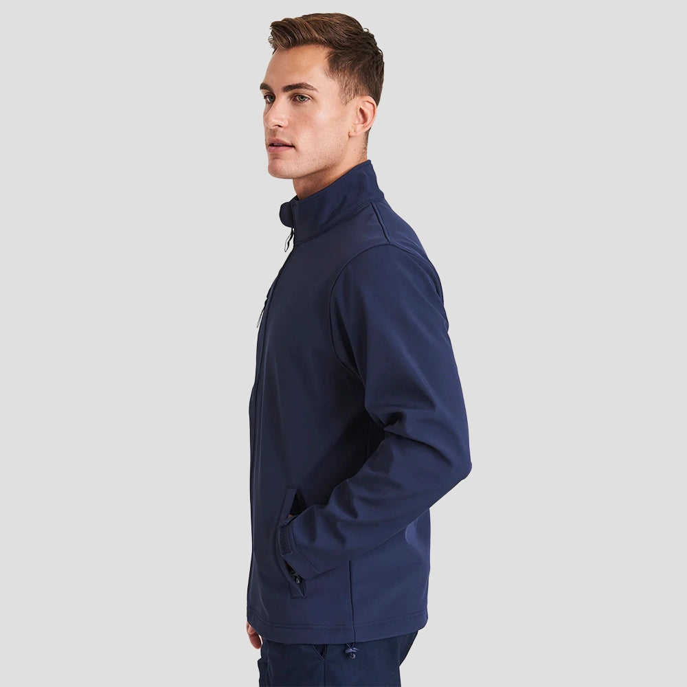 Side view of model wearing the Pro RTX Pro Three Layer Soft Shell Jacket in Navy
