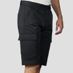 Model wearing the RX605 Pro RTX Pro Cargo Shorts in black side-on