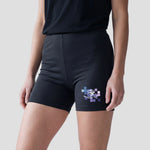 Model wearing the Hawks Netball Club Cropped Shorts – Womens