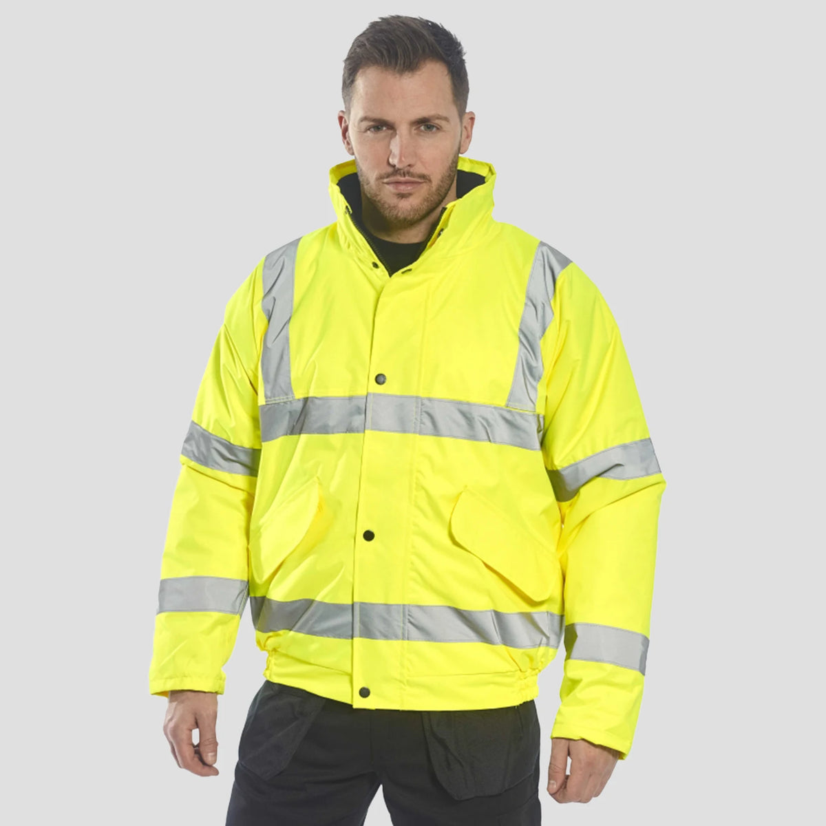 Model wearing the Portwest Hi-Vis Winter Bomber Jacket S463 in Yellow.