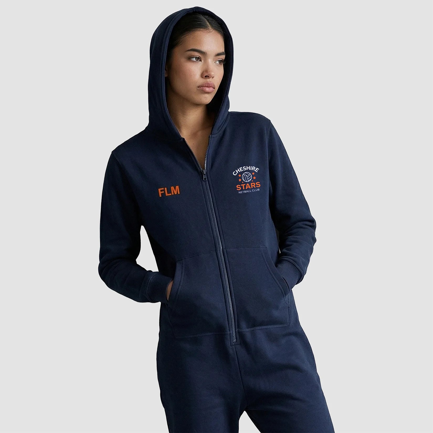 Model wearing the Cheshire Stars Netball Club All In One - Adult