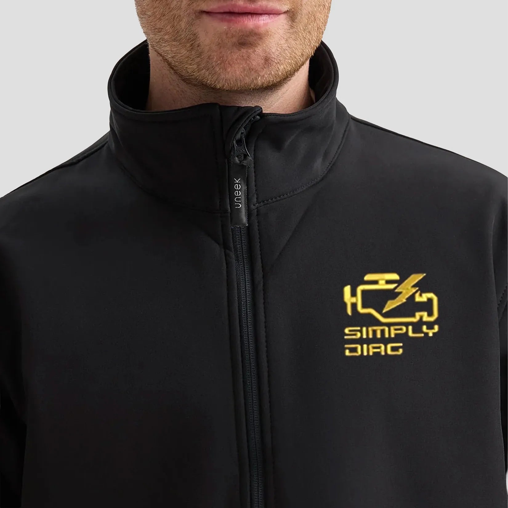 Close-up of Model wearing the SimplyDiag Network Full Zip Soft Shell Jacket UC612 in Black