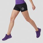 model wearing Appleton Netball Club Cropped Shorts – Adult