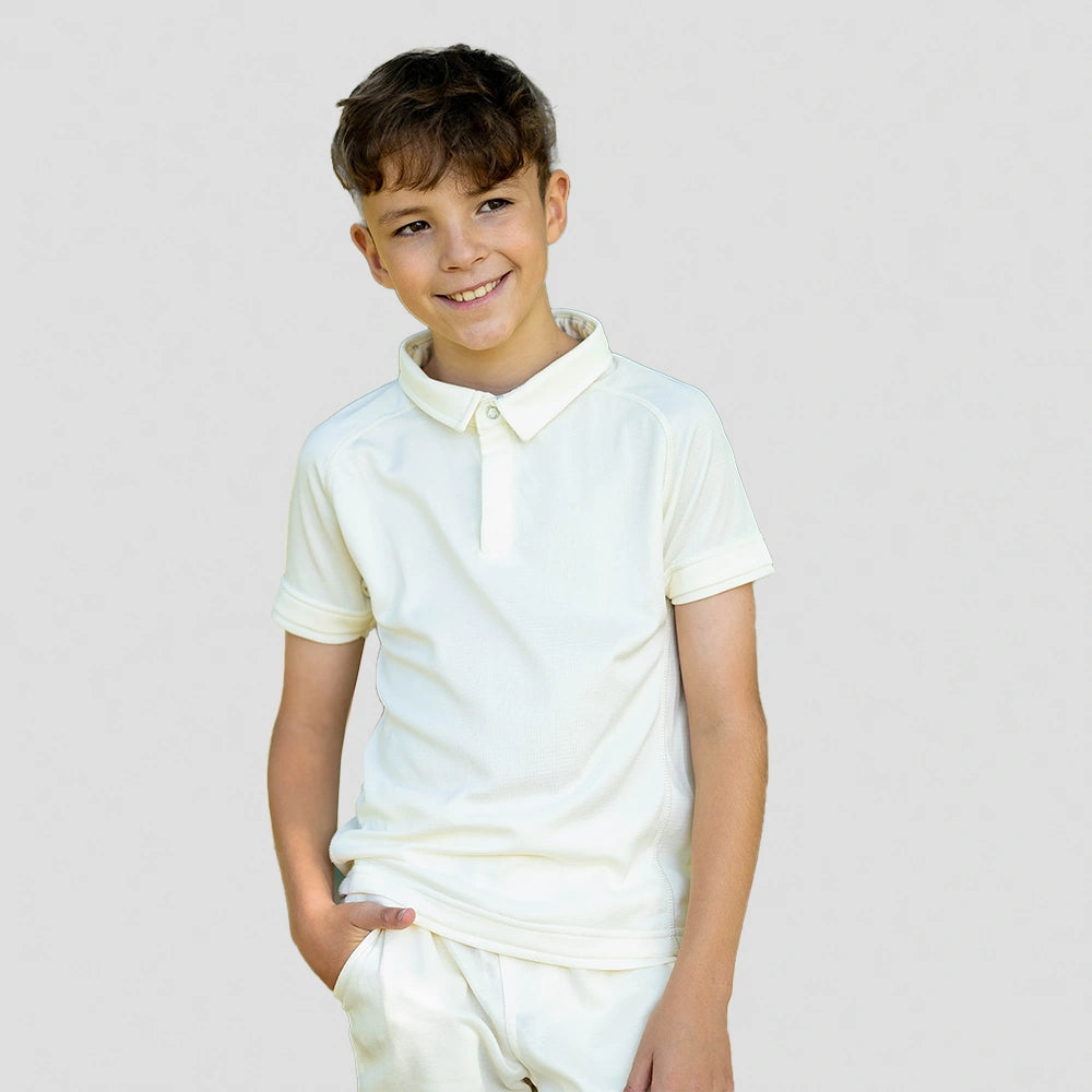 model wearing Stuart Surridge Fuse Short Sleeve Cricket Shirt - Juniors