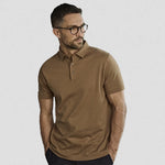 model wearing Pima Cotton Interlock Polo Shirt in wood colour
