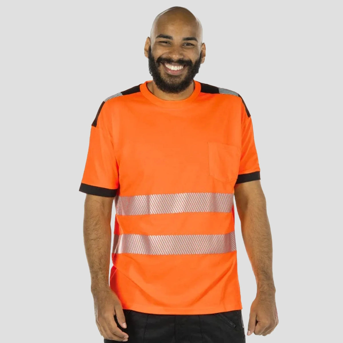 Model wearing the PW3 Hi-Vis Cotton Comfort T-Shirt S/S in Orange.