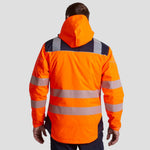 Rear view of model wearing the PW3 Hi-Vis Winter Jacket T400 in Orange.
