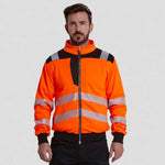 model wearing PW3 Hi-Vis Softshell (3L)
