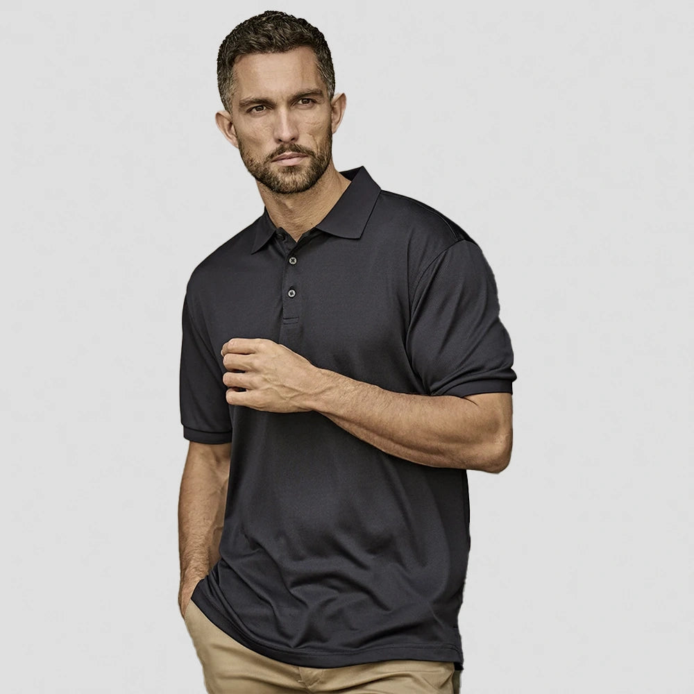 model wearing tee jays Club Polo Shirt