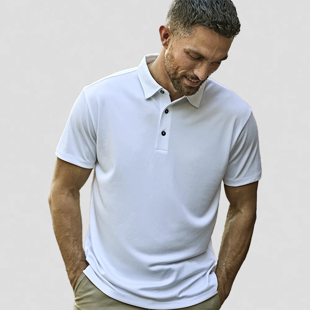 model wearing Tee Jays Luxury Sport Polo Shirt