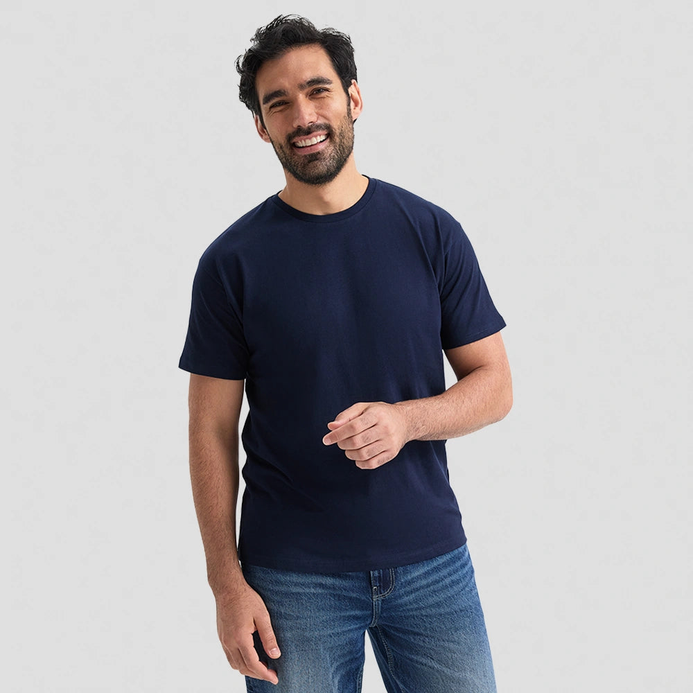 male model wearing Uneek Heavyweight T-Shirt UC302