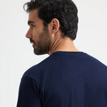 close up back view of model wearing Uneek Heavyweight T-Shirt UC302 in navy