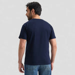 back view of model wearing Uneek Heavyweight T-Shirt UC302 in navy