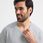 close up front view of model wearing Uneek Classic V Neck T-shirt UC317