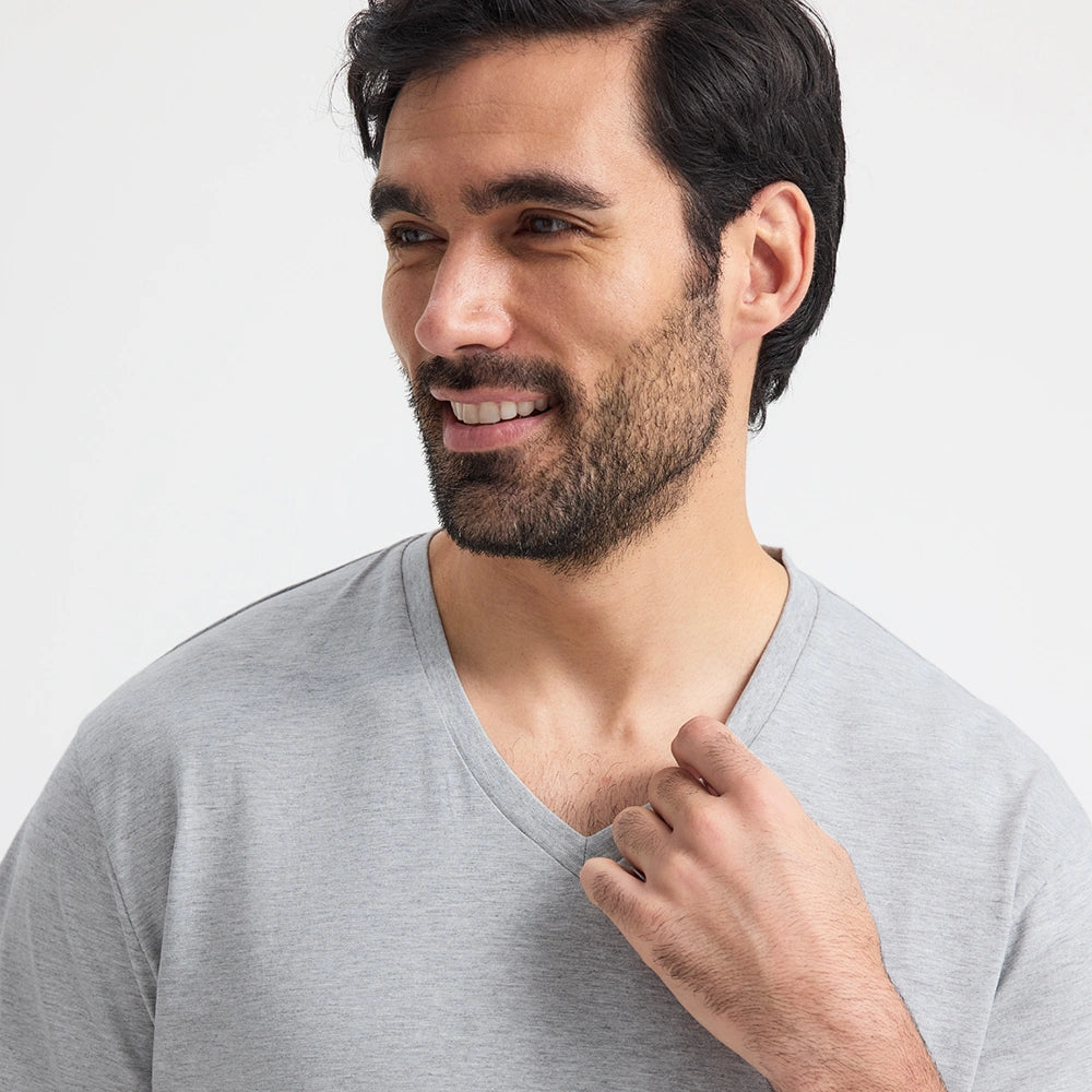 close up front view of model wearing Uneek Classic V Neck T-shirt UC317