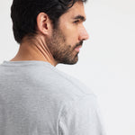 close up back view of model wearing Uneek Classic V Neck T-shirt UC317