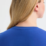close up back view of model wearing Uneek Ladies Classic V-Neck T-Shirt UC319