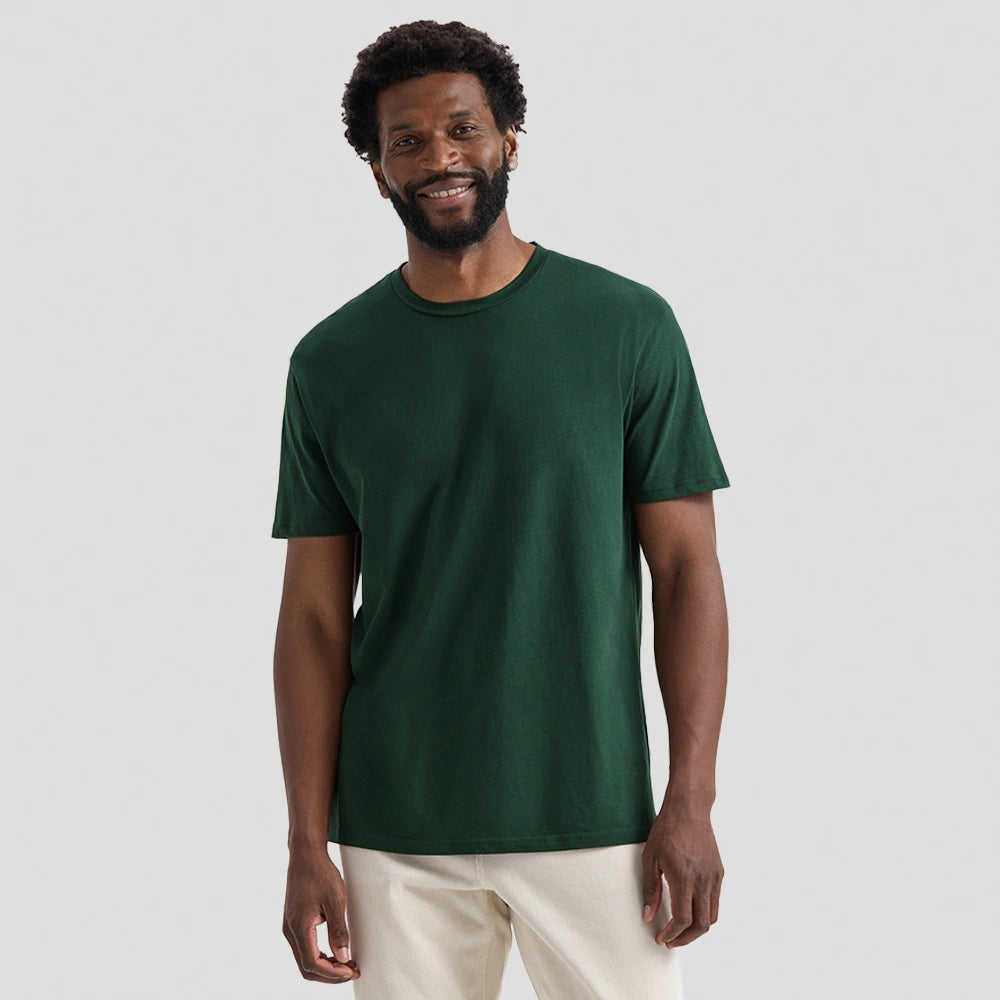 model wearing Uneek Olympic T-shirt UC320