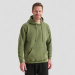 Man wearing a green Classic Hooded Sweatshirt UC502 on a light grey background