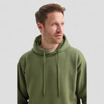 Man wearing a green Classic Hooded Sweatshirt UC502 against a plain background