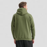 Person wearing a green Classic Hooded Sweatshirt UC502 from behind on a light background