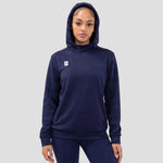 Model wearing the Surridge Sport VOLT hoodie in Navy.