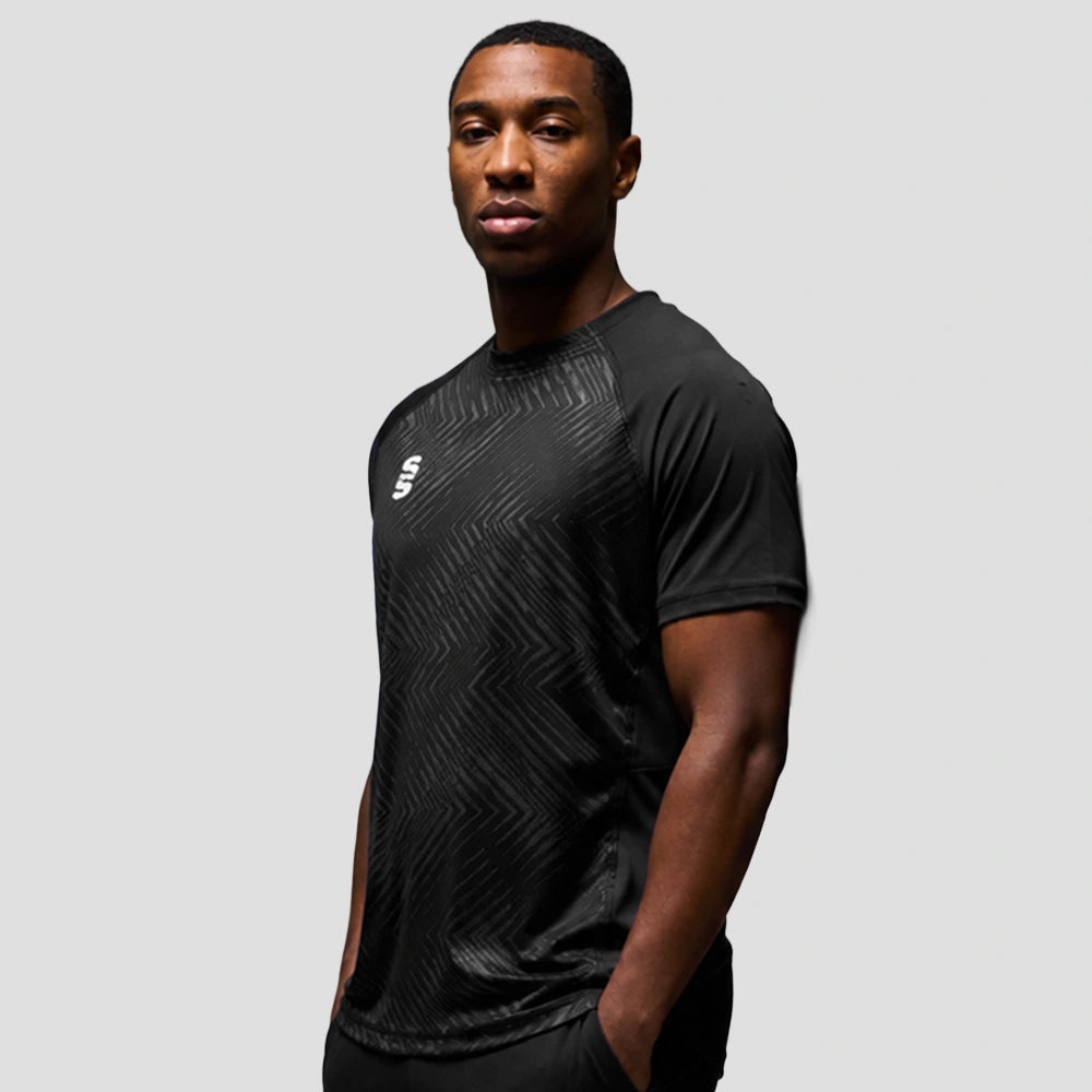 Model wearing the Men's Volt T-Shirt in Black.