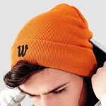 Model wearing the Winsford ASC Cuffed Beanie (Orange) BB45