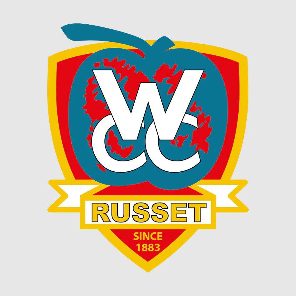 Weaverham Cricket Club logo, red and gold shield featuring a blue apple design with bold white WCC letters and the word Russet below, representing the official branding for Weaverham Cricket Club with team kits and club merchandise supplied by Buccaneer Group.