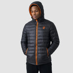 Model wearing the Winsford ASC Padded Jacket – Adults RS233M in Black / Orange