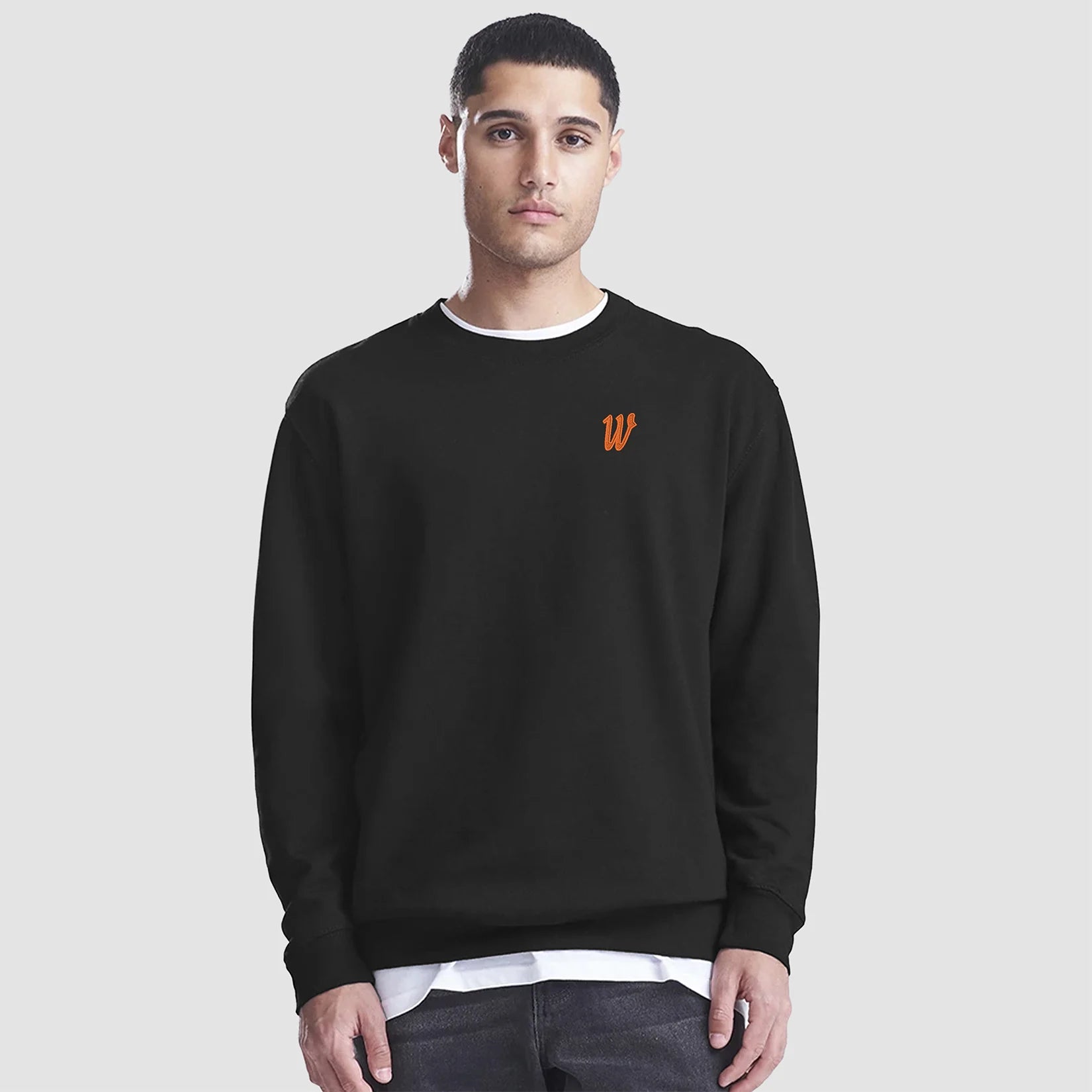 Model wearing the Winsford ASC Premium Sweat – Adults JH030 in Jet black