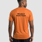 Rear view of Model wearing the Winsford ASC Team T-Shirt – Adult (Orange) JC001