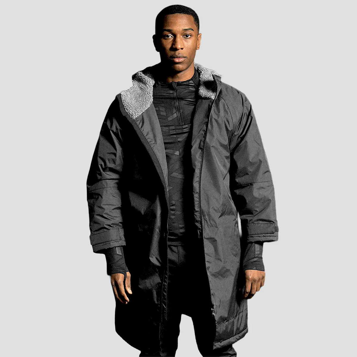 Model wearing the Stuart Surridge Fleece Robe Jacket in Black.