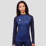 Model wearing the Women's Volt 1/4 Zip Performance Top in Navy.
