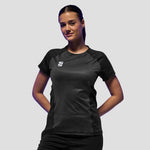 Model wearing the Surridge Sport Women's Volt T-Shirt in Black.