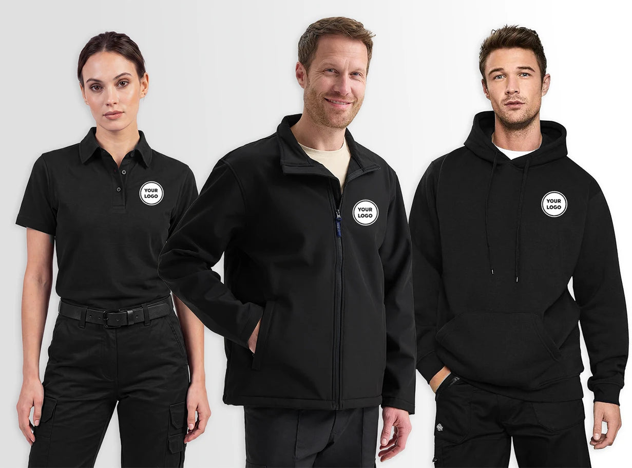 Three models wearing black branded uniform apparel, including a polo shirt, hoodie, and zip-up jacket, each with a circular white-and-black logo patch on the left chest, photographed against a light grey studio background.