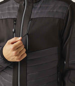 Model wearing the Regatta E-Volve Unisex Thermal Hybrid Jacket in Ash/Black