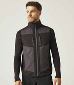 Model wearing Regatta E-Volve Unisex Two Layer Soft Shell Bodywarmer in Ash / Black